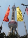 Tower thru Flags in Shanghai, China, photo by Charles Foster